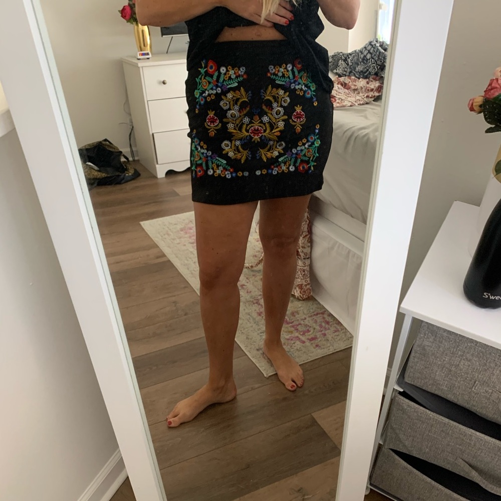 Black embroidered mini skirt